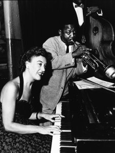 Marian McPartland, who became an articulate spokeswoman for jazz, and the jazz trumpeter Roy Eldridge around the 1950s. 
