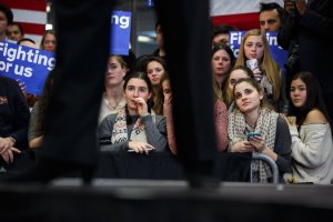 Women listening to Hillary Clinton at a campaign event in New Hampshire